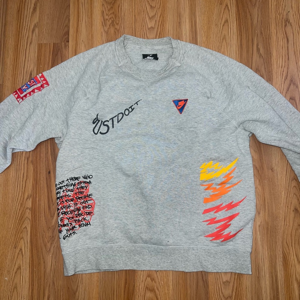 Nike Gray Crewneck Sweatshirt with Multicolor Graphic Accents